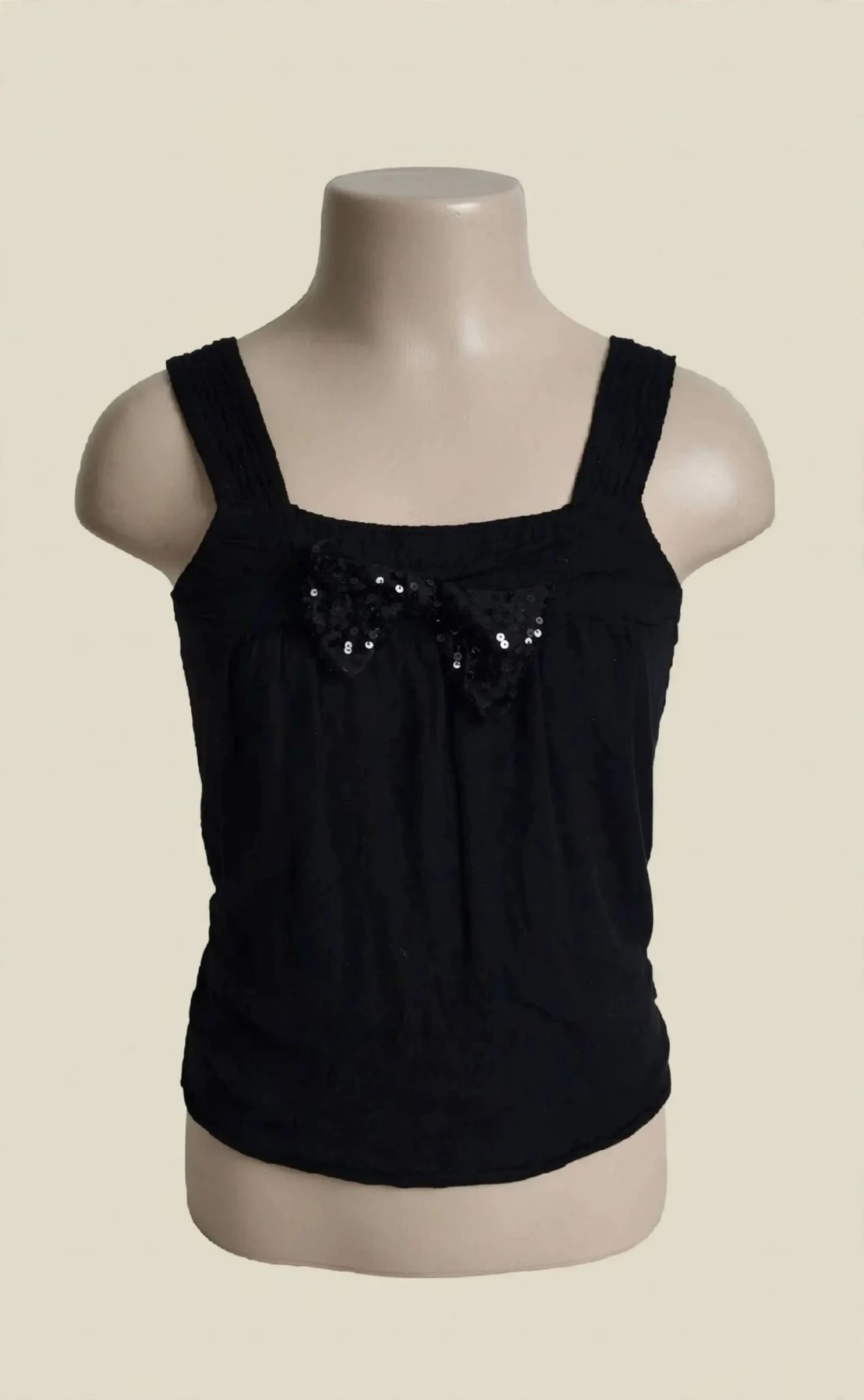 Top noir sans manches noeud sequins fille 10 ans